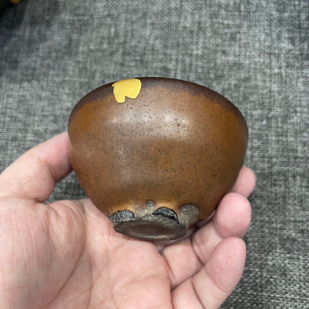 Song Dynasty persimmon-red glaze bell-shaped cup, restored with gold repair technique, Jianzhan tea cup