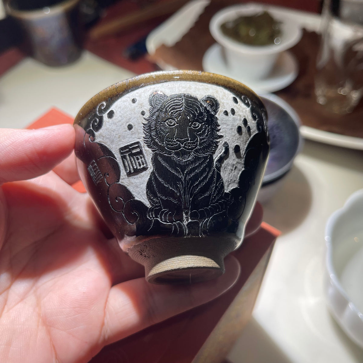 Cute little tiger, Jianzhan tea cup hand-carved