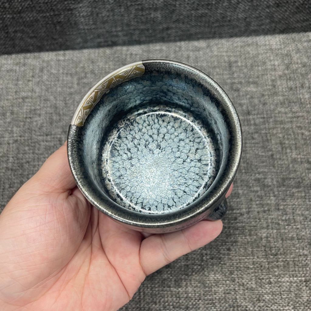 Imitating the gold and silver inlaying technique from the Warring States period, Jianzhan oil-drop three-legged incense burner