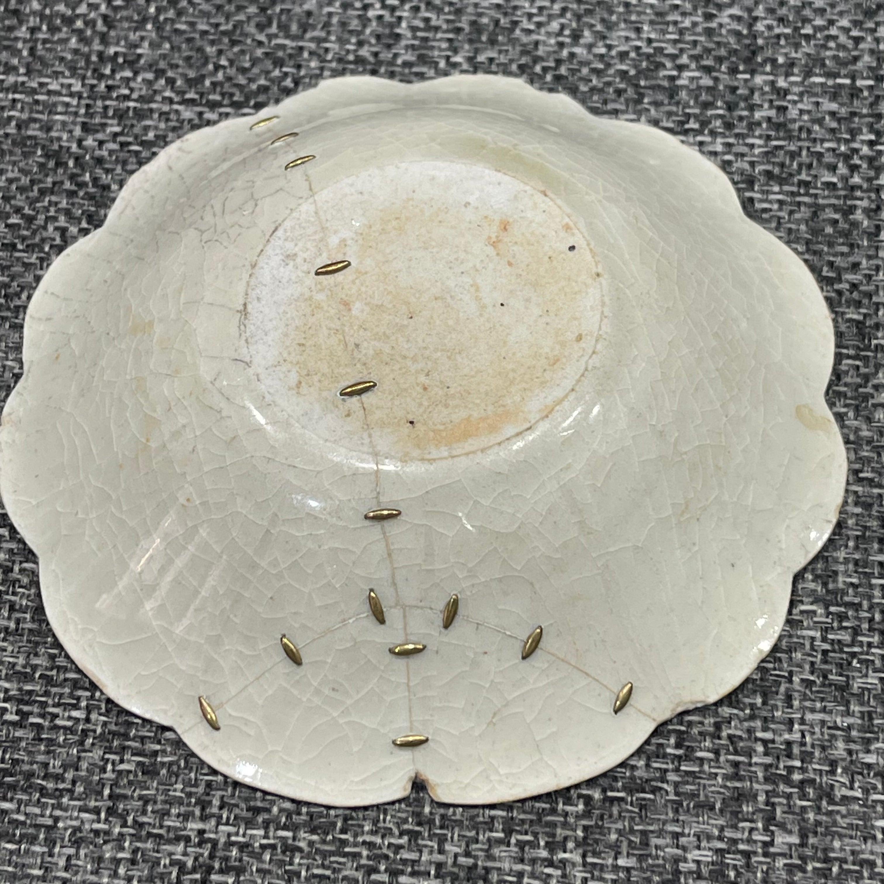 Futian Kiln, small tea saucer from the Song Dynasty, repaired with brass rivets