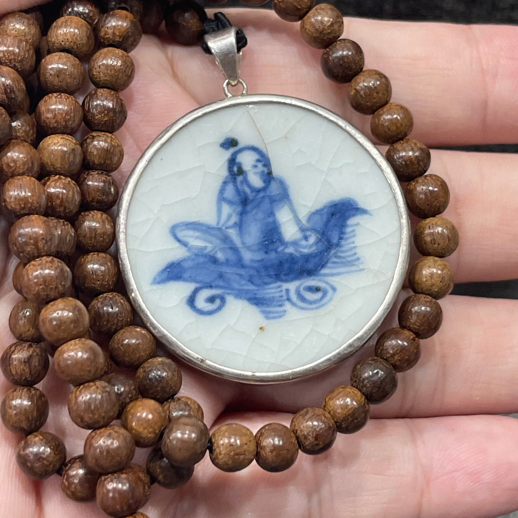 Blue and white porcelain fragment, pendantTeak wood necklace