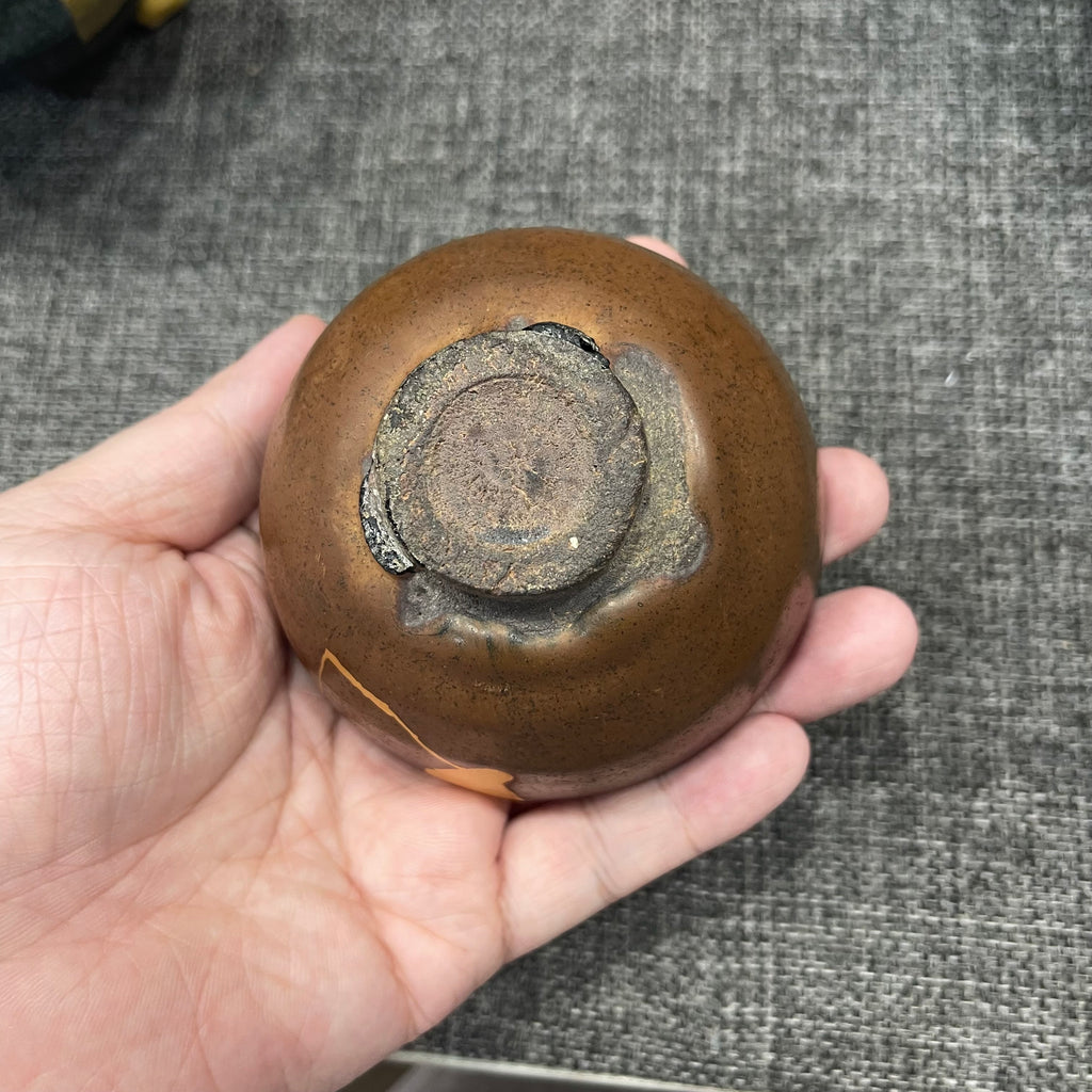Song Dynasty persimmon-red glaze bell-shaped cup, restored with gold repair technique, Jianzhan tea cup