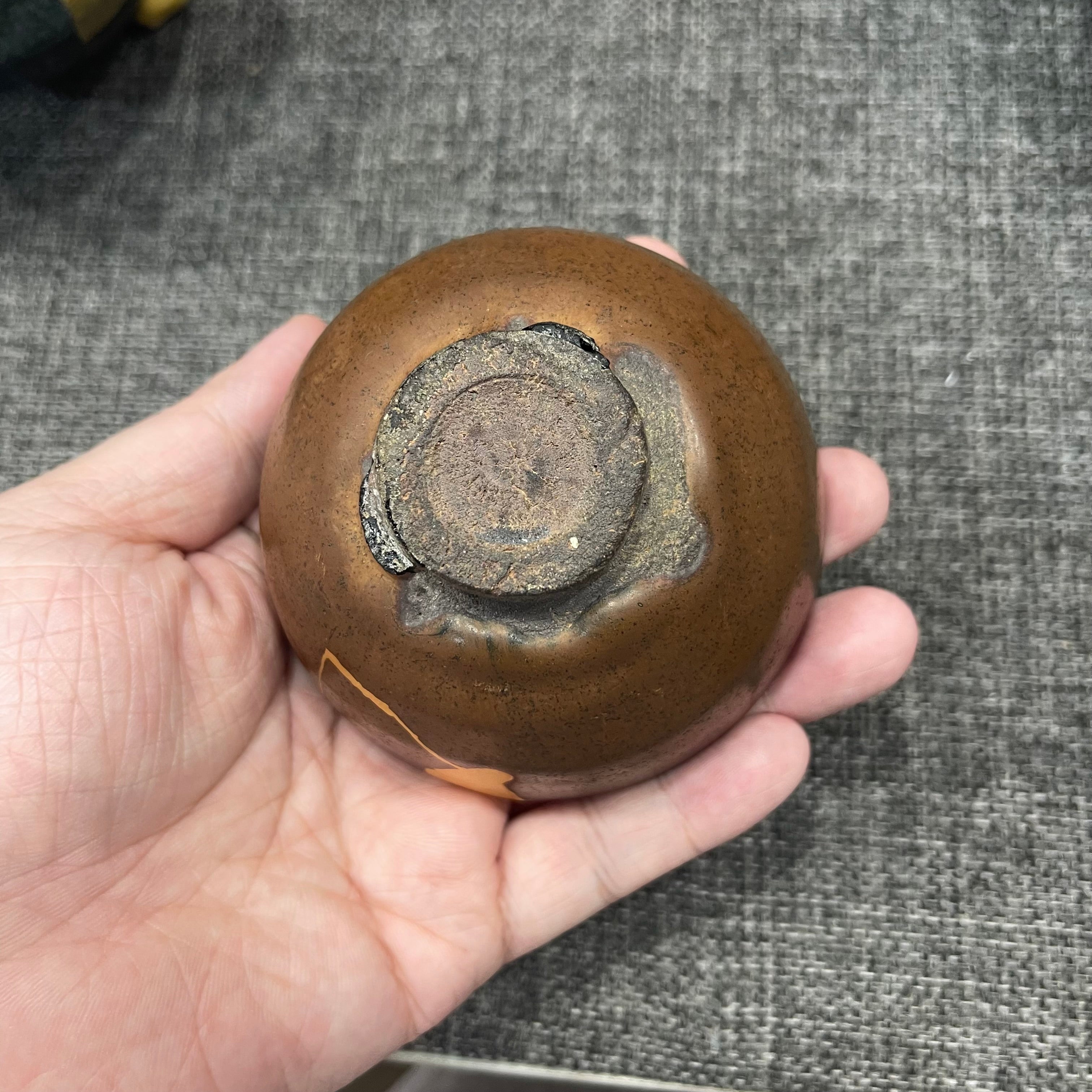 Song Dynasty persimmon-red glaze bell-shaped cup, restored with gold repair technique, Jianzhan tea cup
