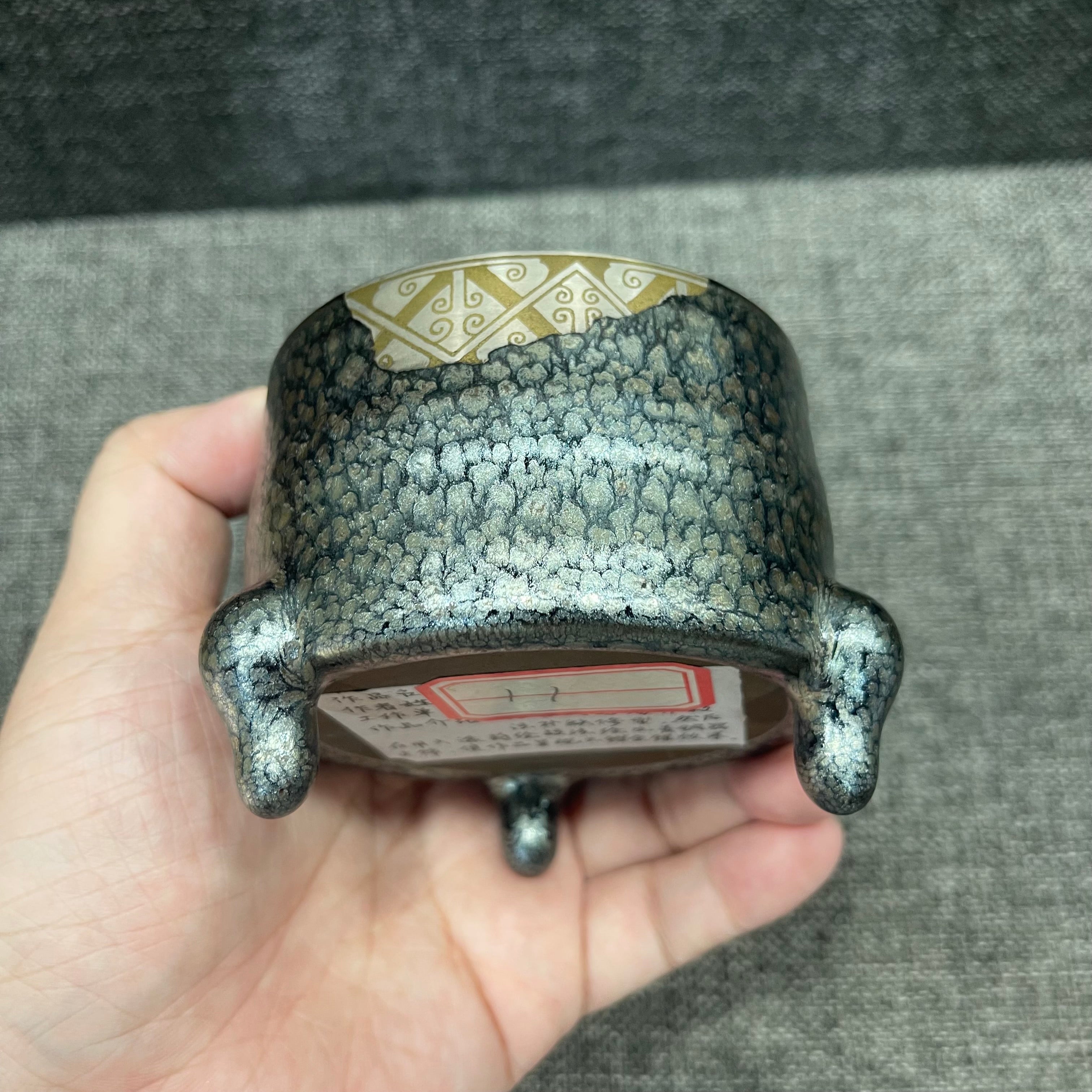 Imitating the gold and silver inlaying technique from the Warring States period, Jianzhan oil-drop three-legged incense burner