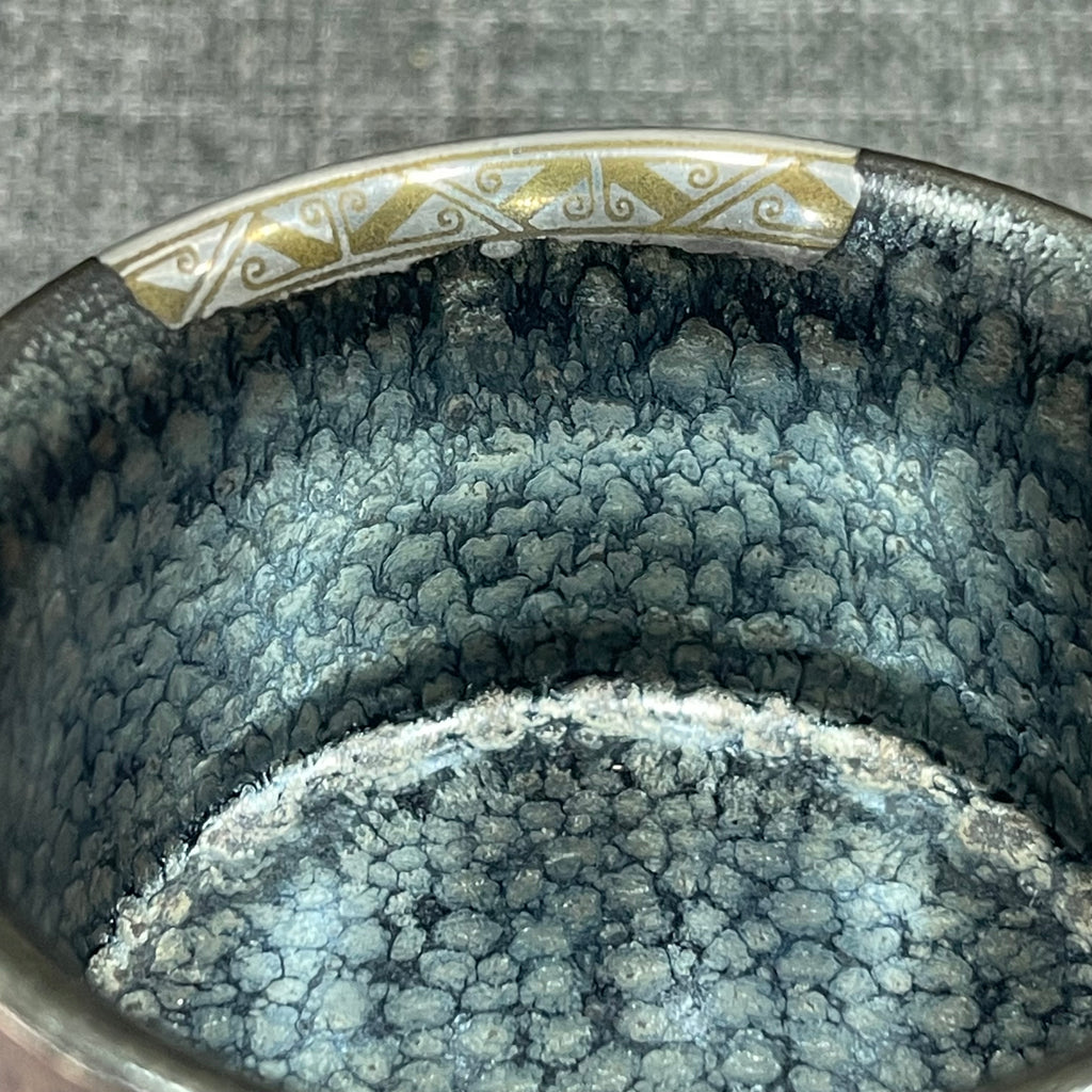 Imitating the gold and silver inlaying technique from the Warring States period, Jianzhan oil-drop three-legged incense burner