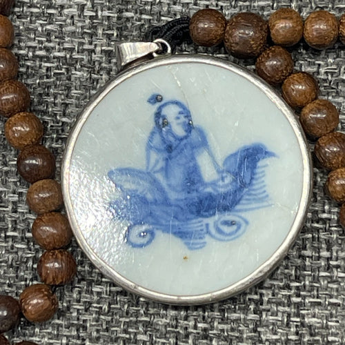 Blue and white porcelain fragment, pendantTeak wood necklace
