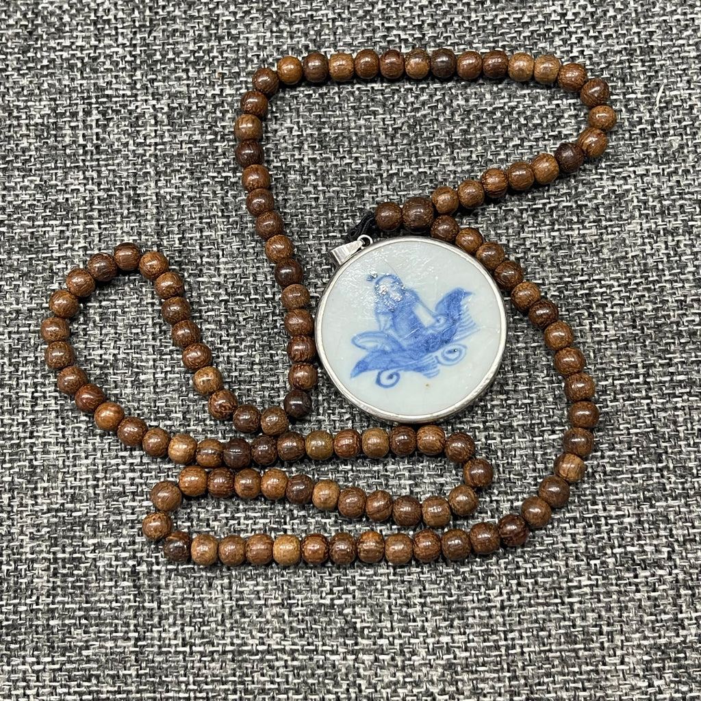 Blue and white porcelain fragment, pendantTeak wood necklace