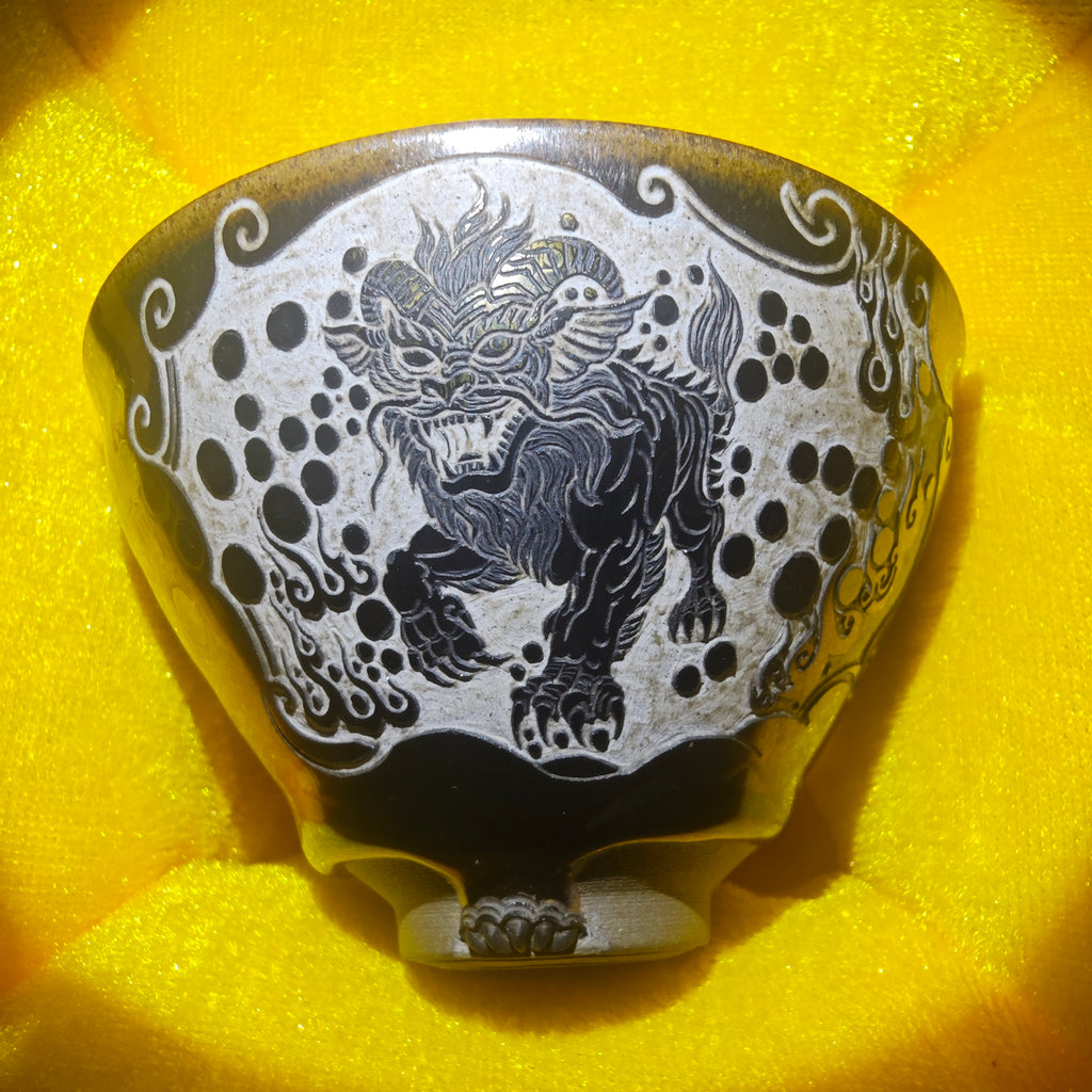 Ancient Chinese mythical beast Taotie, traditional Chinese pattern carved teacup