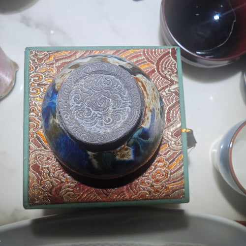 Colorful Jianzhan teacup with auspicious cloud carving