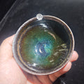 Ink jade ash-burned Jianzhan teacup, hand-carved with wave patterns