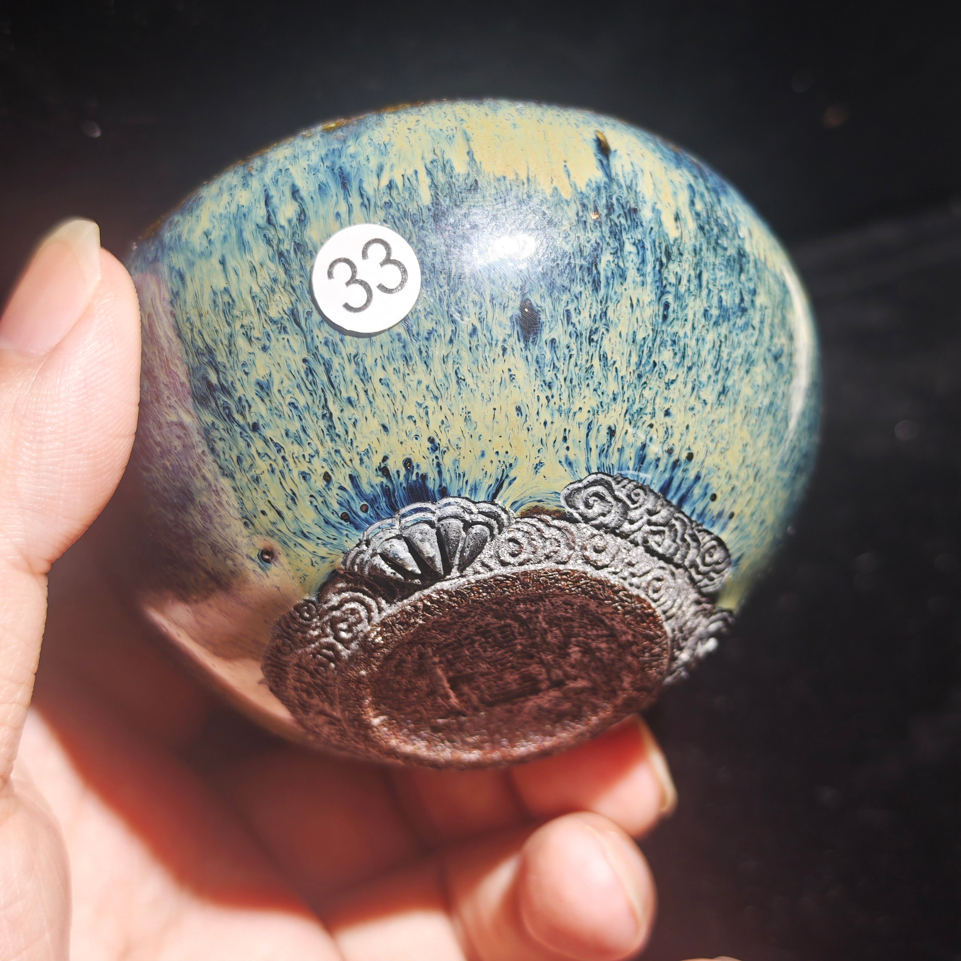 Ash-covered Jianzhan tea cup, hand-carved with animal claw and auspicious cloud patterns
