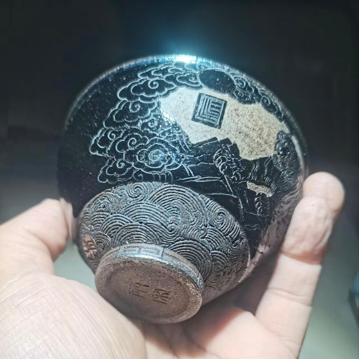 Tiger Descending the Mountain, hand-carved black-glazed teacup