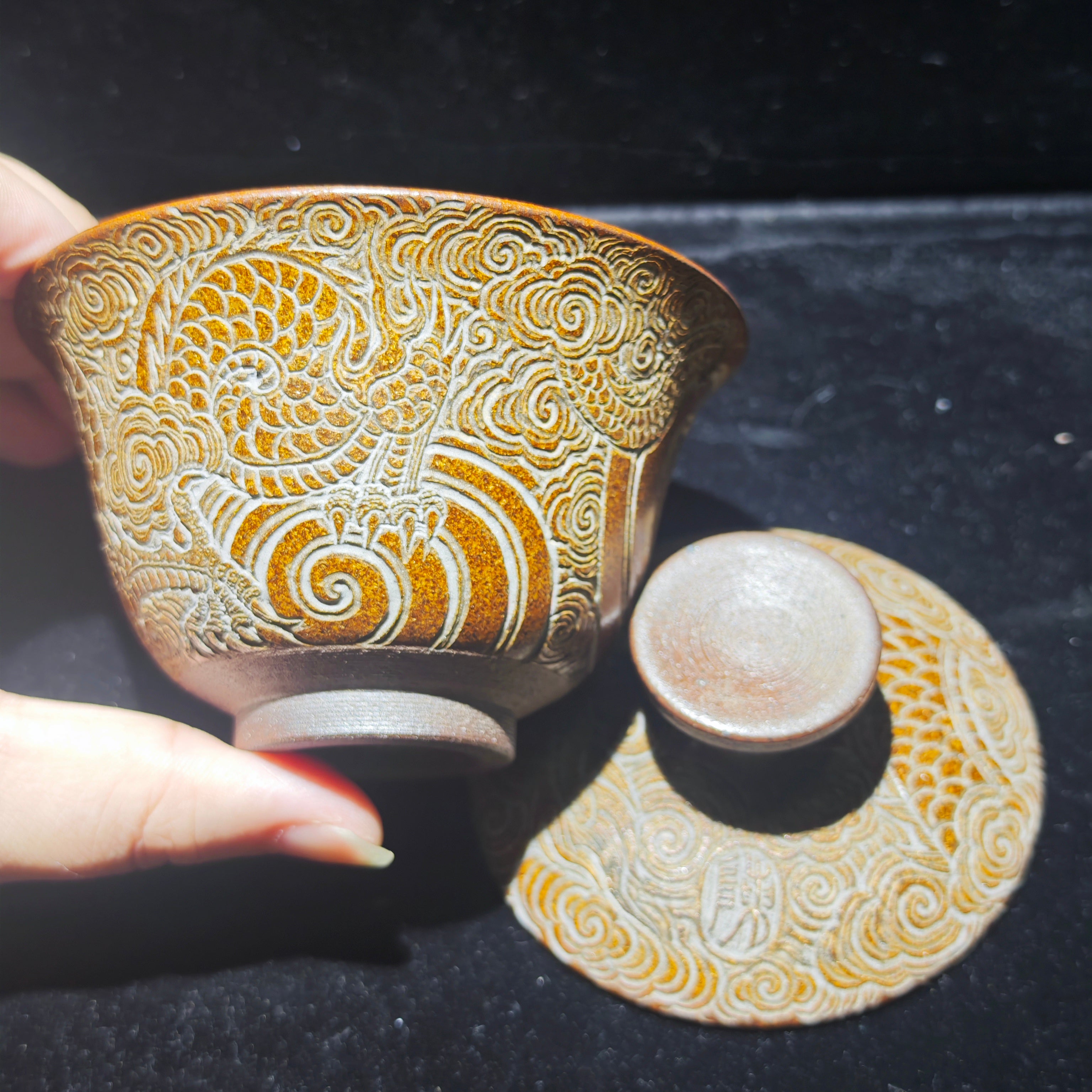 Only when fully staffed can we make the bowls, with dragon patterns carved on them