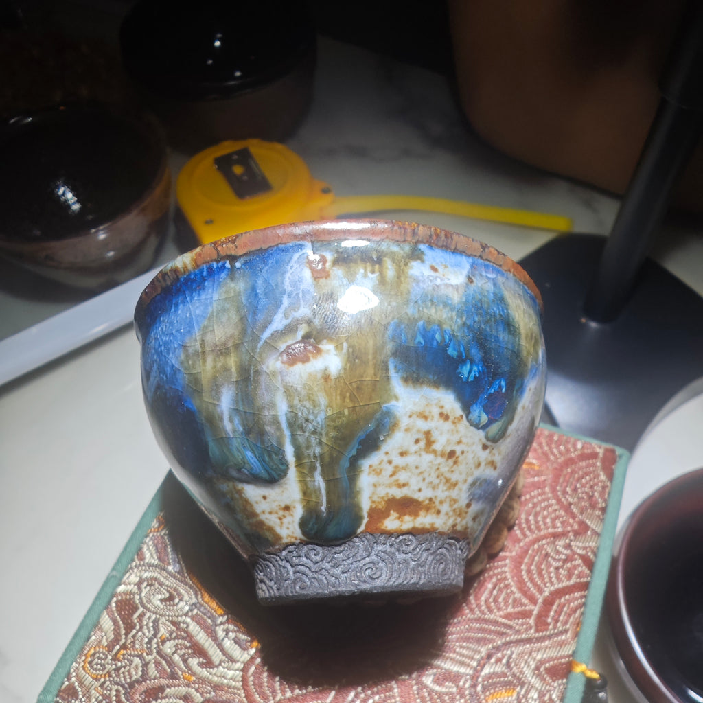 Colorful Jianzhan teacup with auspicious cloud carving