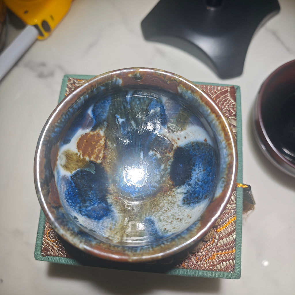 Colorful Jianzhan teacup with auspicious cloud carving