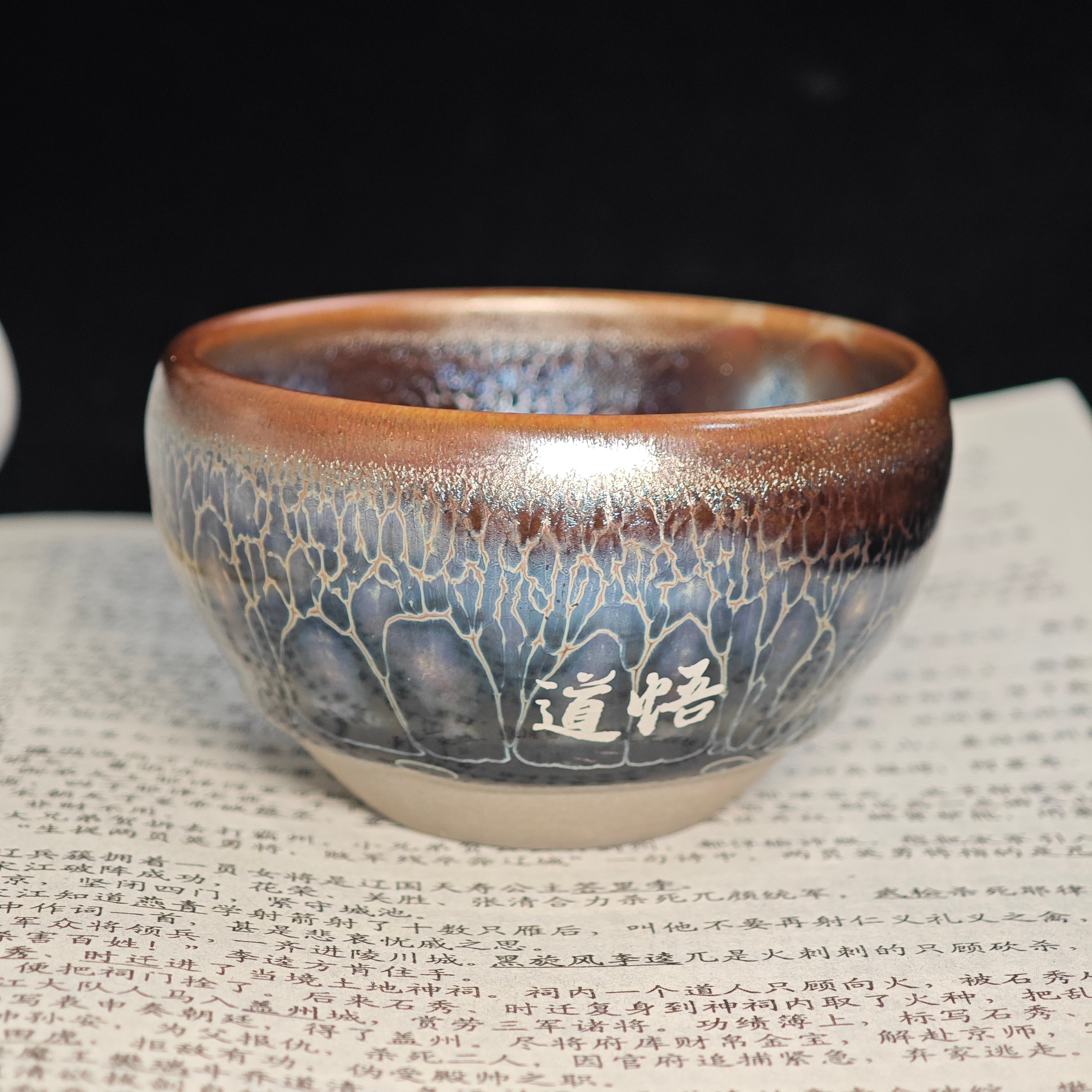 Build a cup with gold and silver inlay.