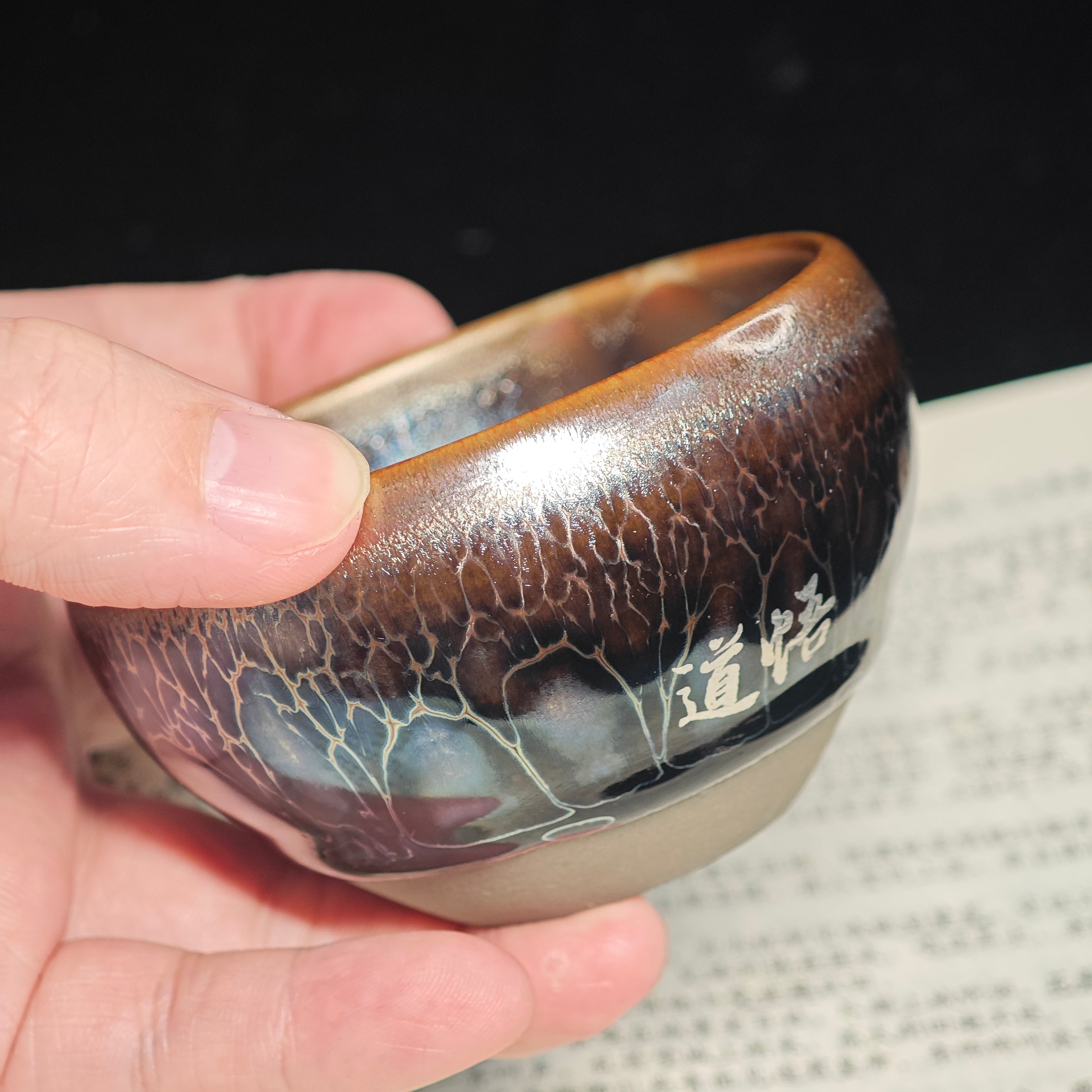 Build a cup with gold and silver inlay.