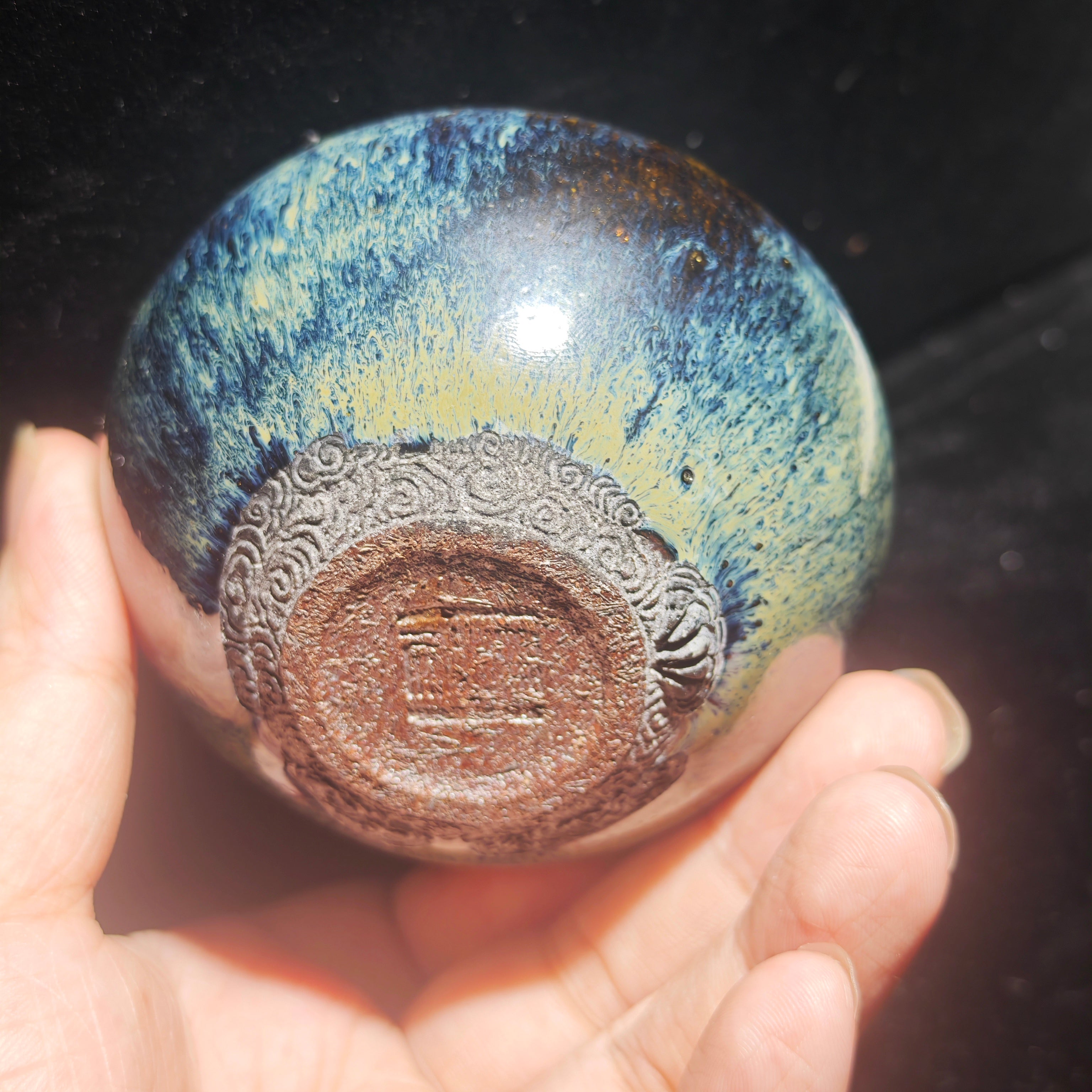 Ash-covered Jianzhan tea cup, hand-carved with animal claw and auspicious cloud patterns