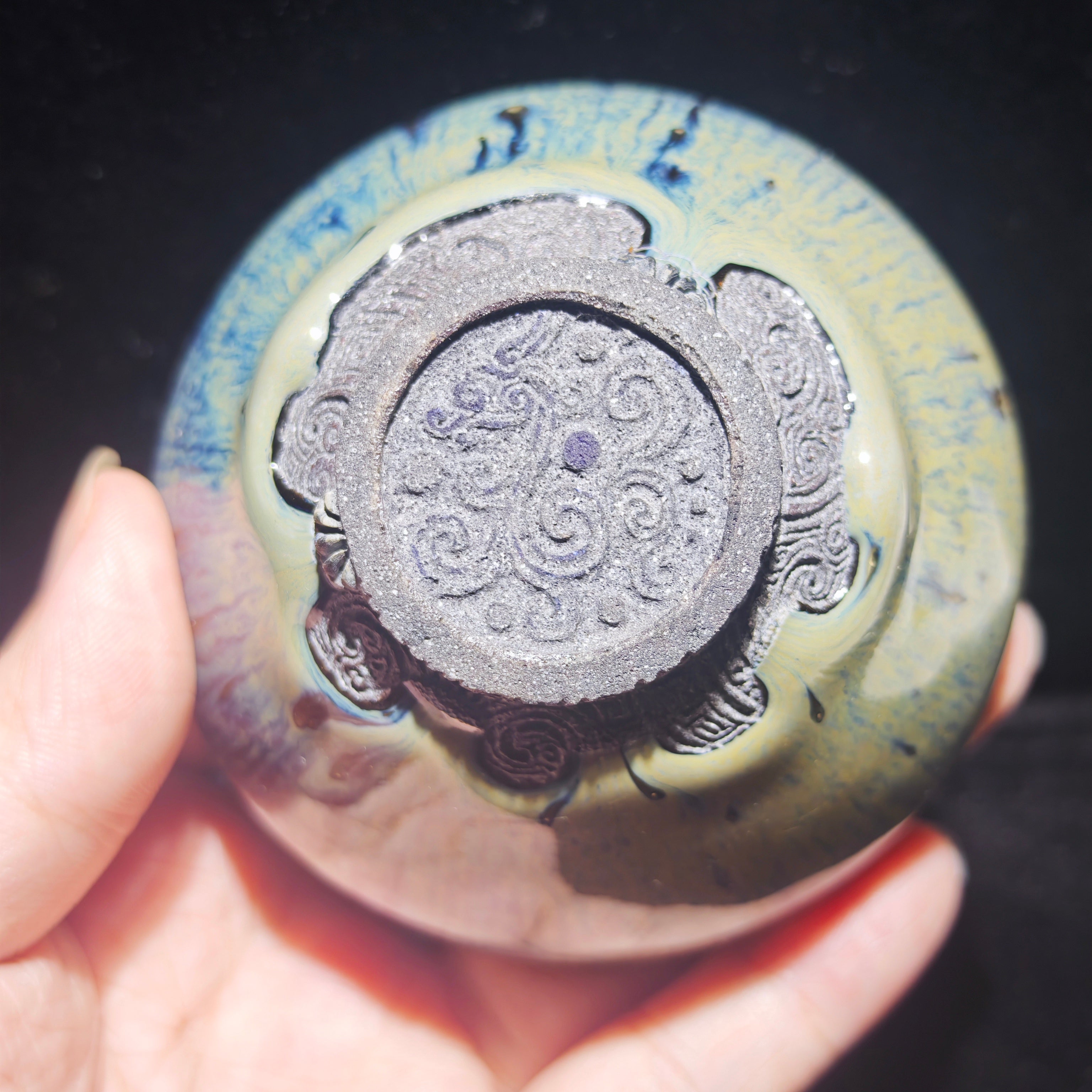 Ash-burned Jianzhan tea cup with animal claw foot and dragon carving, handmade craft
