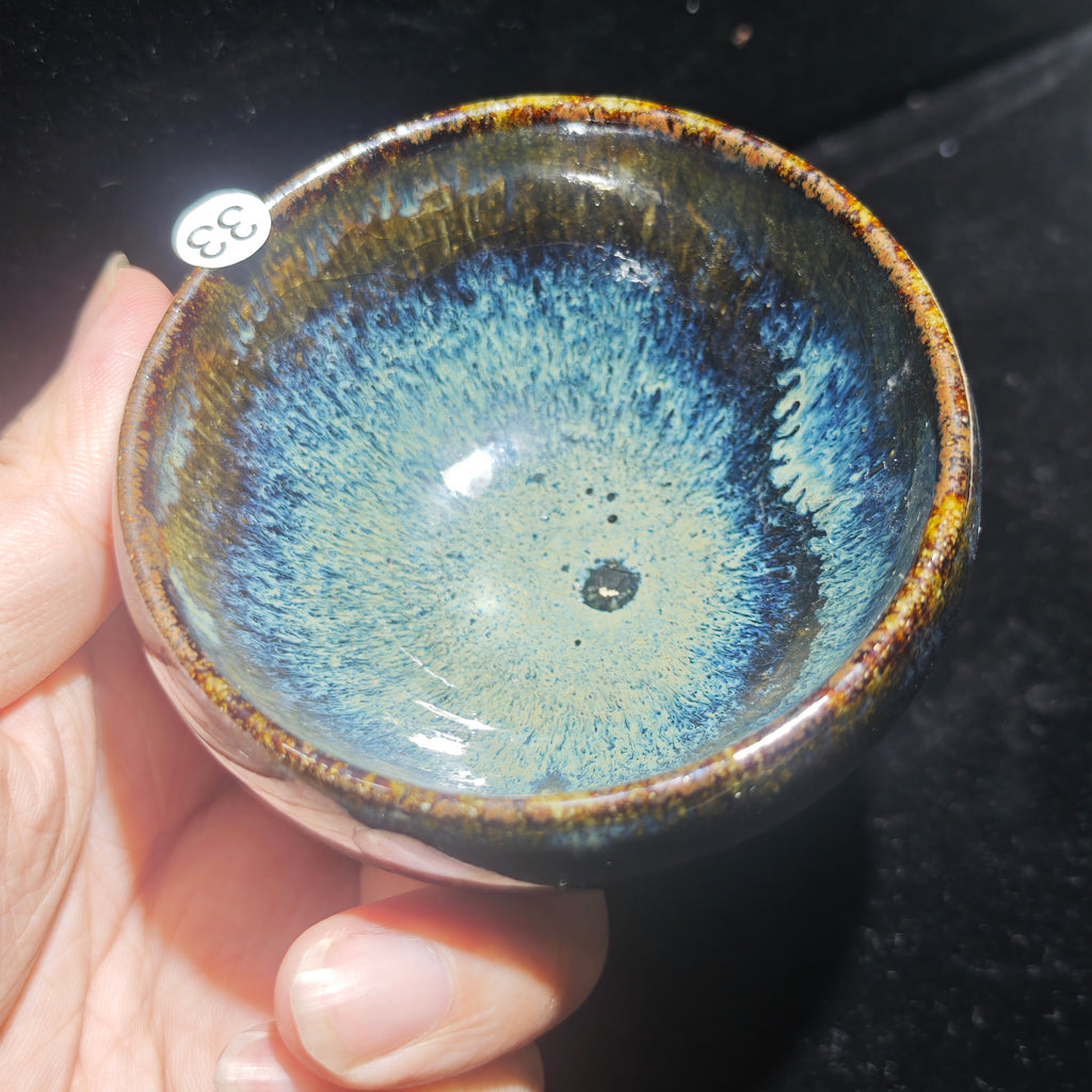 Ash-covered Jianzhan tea cup, hand-carved with animal claw and auspicious cloud patterns