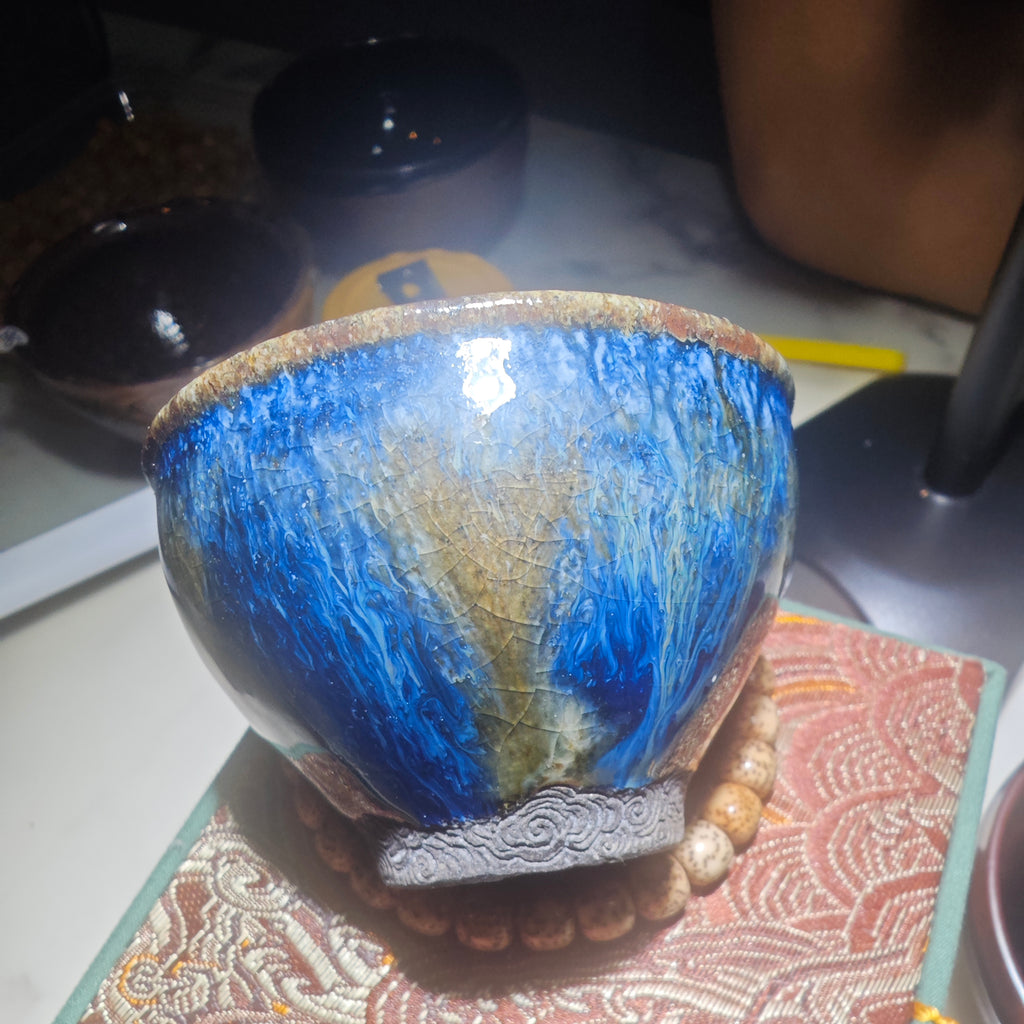 Colorful Jianzhan teacup with auspicious cloud carving