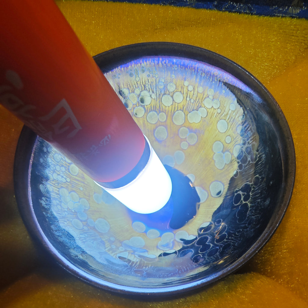 Pi Xiu pattern, symbolizing good luck, with a carved design on the Jian Zhan tea cup