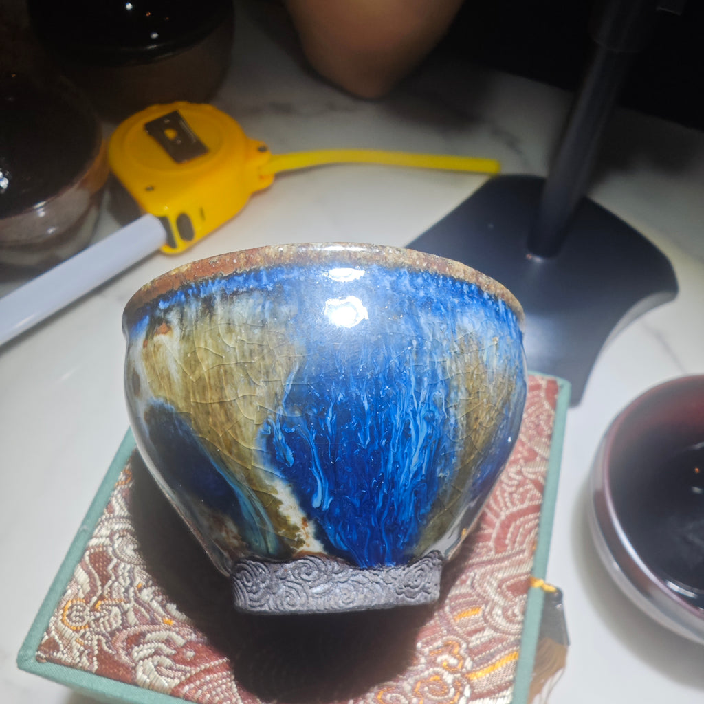 Colorful Jianzhan teacup with auspicious cloud carving