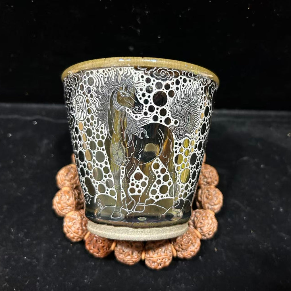 Galloping steeds, hand-carved teacups