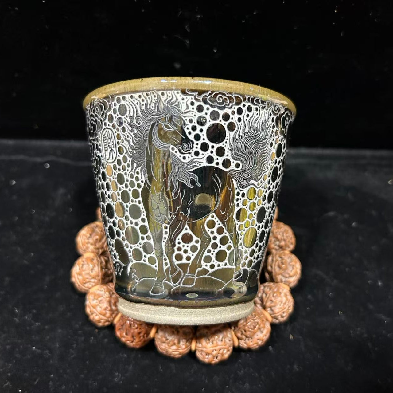 Galloping steeds, hand-carved teacups
