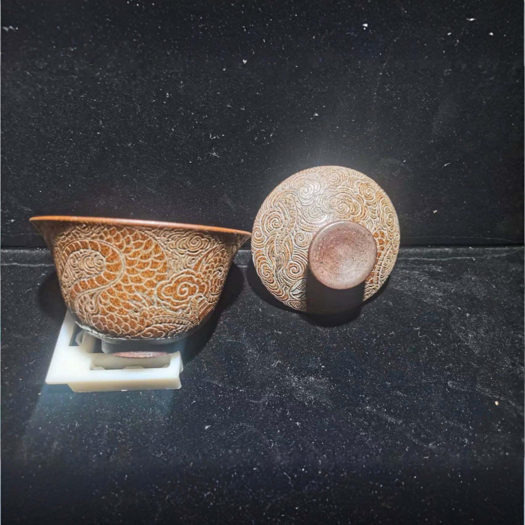 Only when fully staffed can we make the bowls, with dragon patterns carved on them